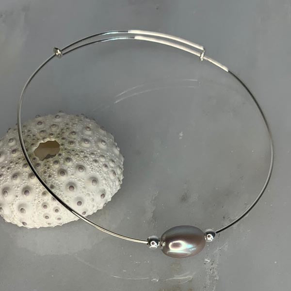 Fine silver bangle bracelet with gray pearls and silver beads