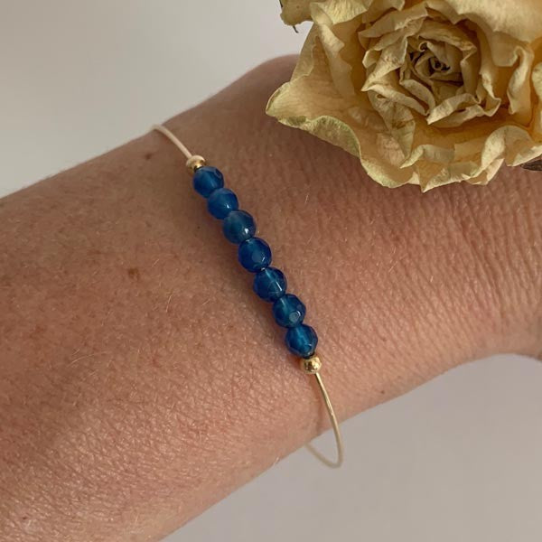 Fine gold filled bangle bracelet with 7 blue agates