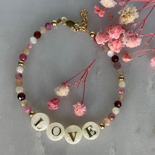 Gold plated Love bracelet with pink stones 