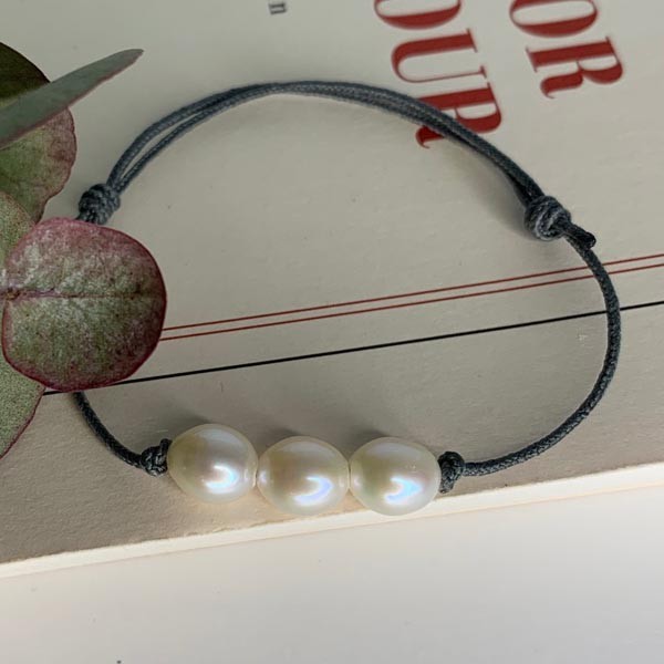 Cord bracelet 3 oval white freshwater pearls