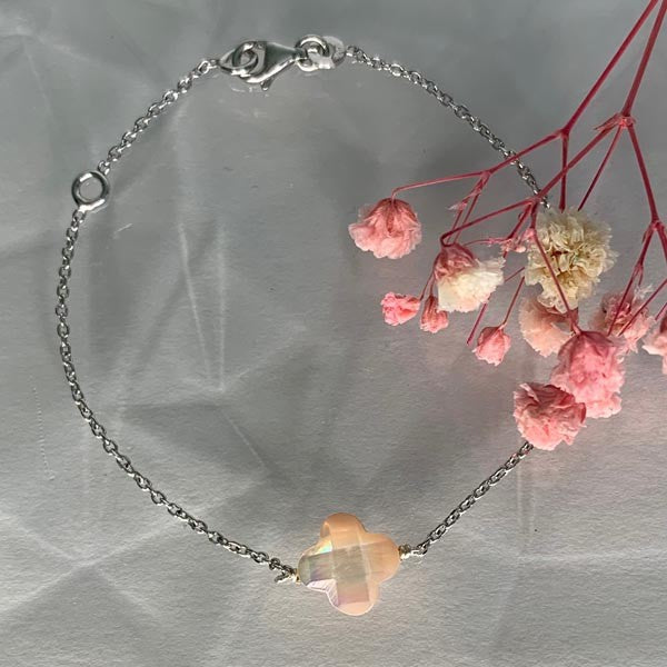 Silver chain bracelet with small faceted pink mother-of-pearl cross