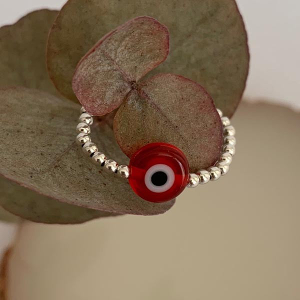 Mini silver pearl ring with red eye 