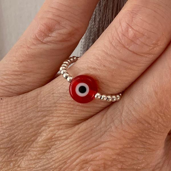 Mini silver pearl ring with red eye 