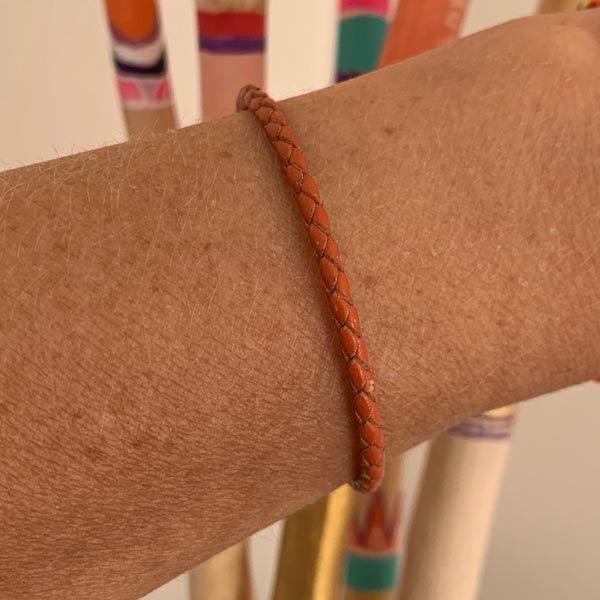 Orange braided leather bracelet