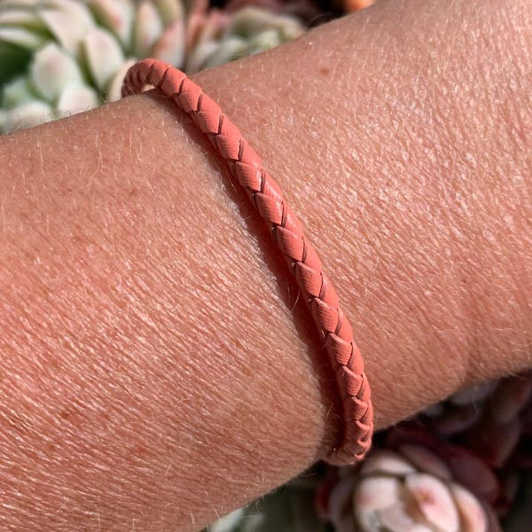 Braided coral leather bracelet