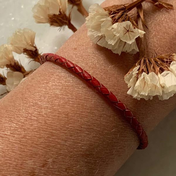 Red braided leather bracelet