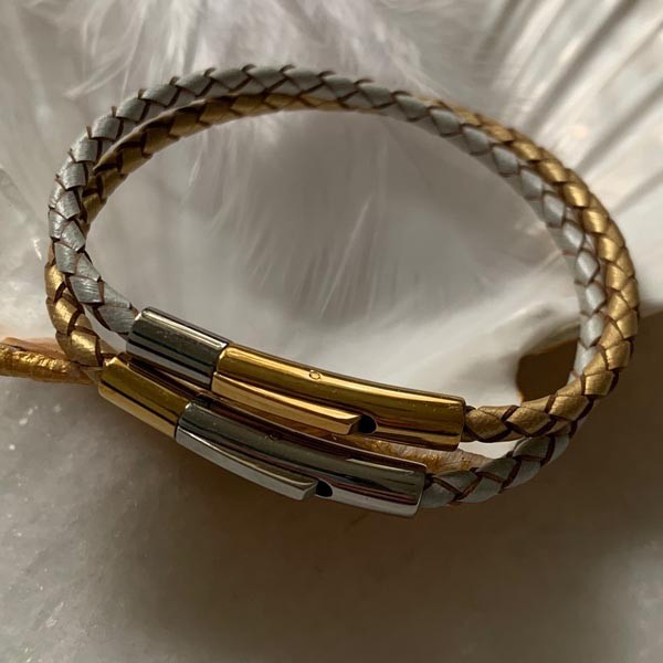 Duo of braided gold and silver leather bracelets