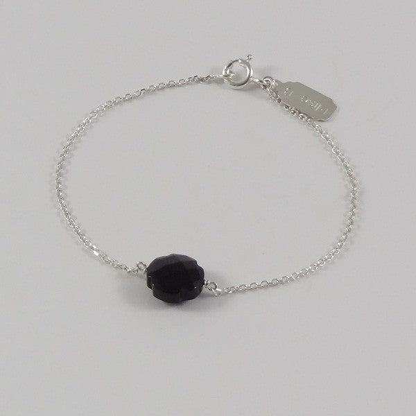 Silver chain bracelet with small faceted onyx cross