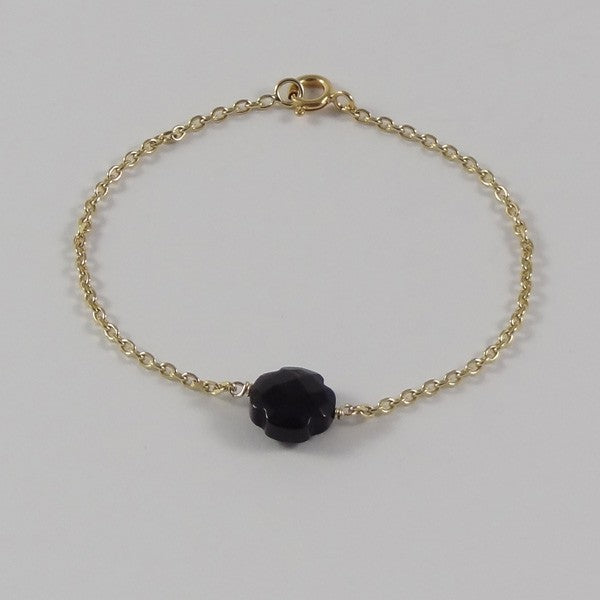 Gold plated chain bracelet with small faceted onyx cross