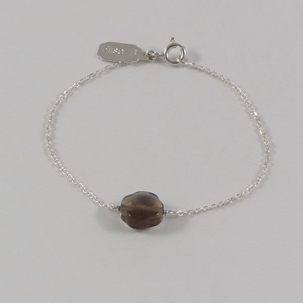 Silver chain bracelet with small faceted smoky quartz cross