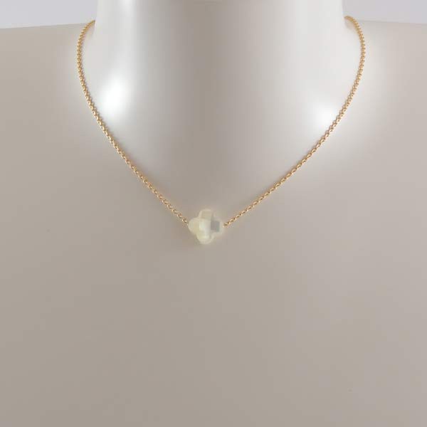 Gold plated chain necklace with small faceted white mother-of-pearl cross