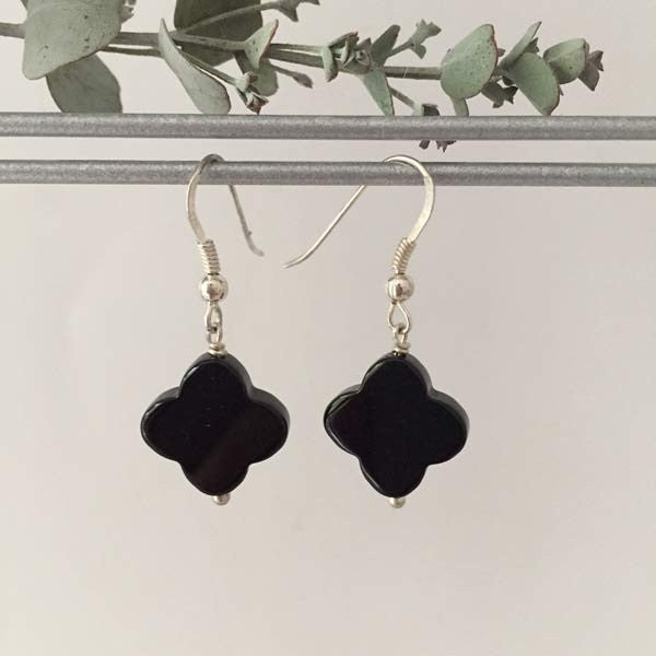 Silver earrings with large onyx crosses