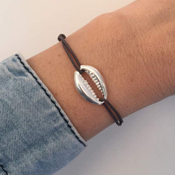 Silver cowrie cord bracelet