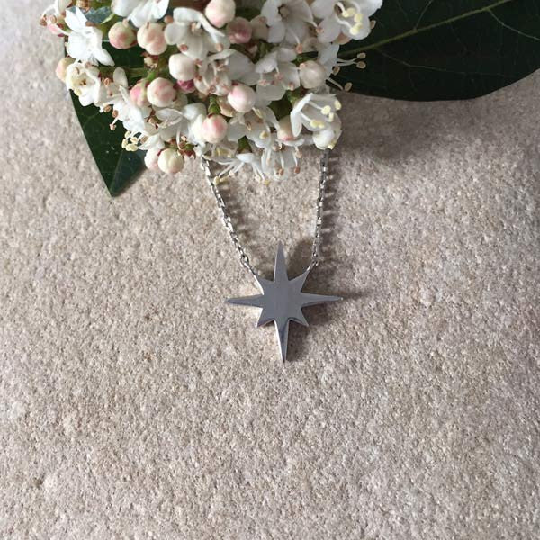 Silver chain necklace with small 6-pointed star