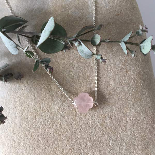 Silver chain necklace with small faceted rose quartz cross