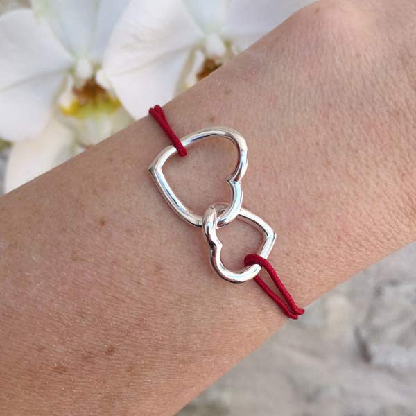 Silver intertwined hearts cord bracelet