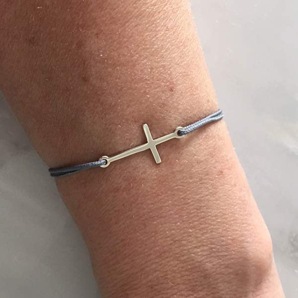 Small silver cross cord bracelet