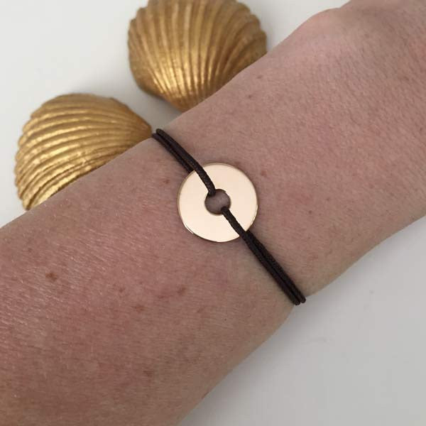 Children's bracelet with small gold-plated target