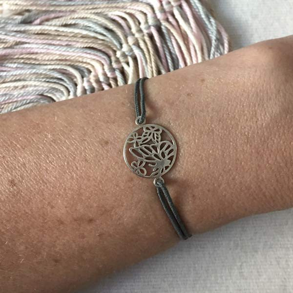 Silver butterfly pattern cord bracelet