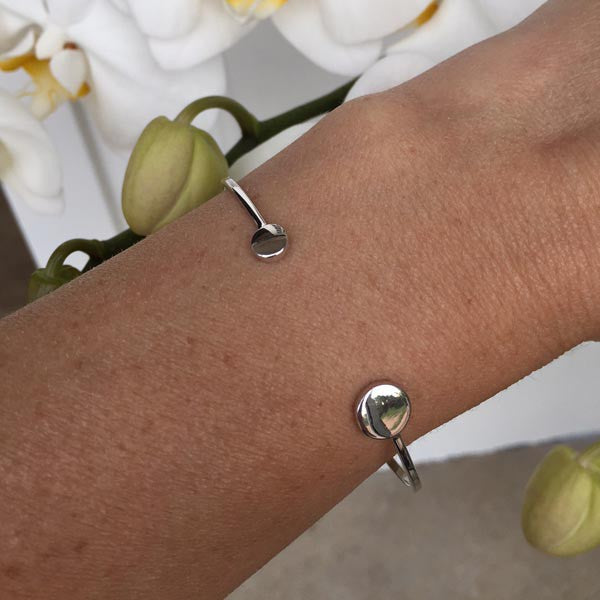 Fine silver bangle bracelet with pastilles