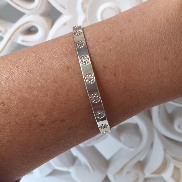 Silver flower bangle bracelet