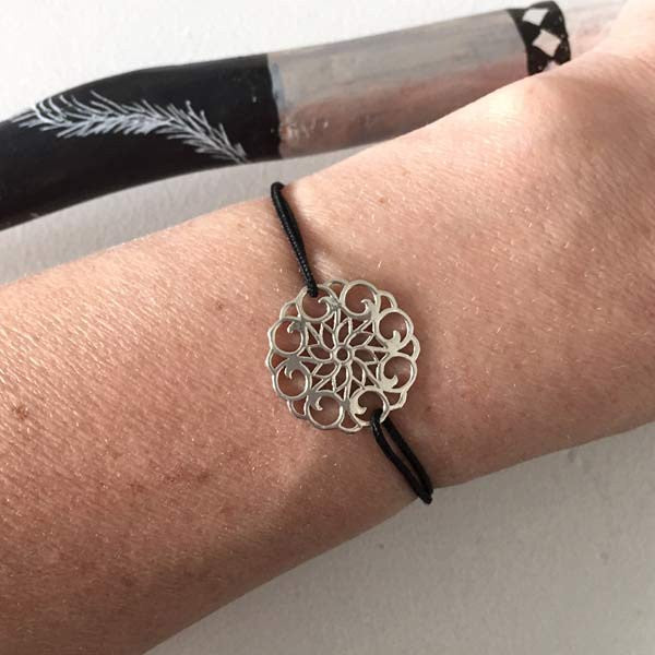 Silver rosette cord bracelet