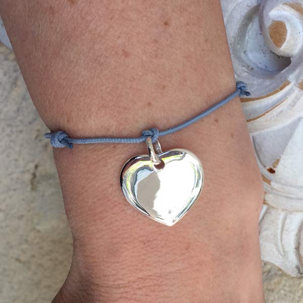 Silver heart medal cord bracelet