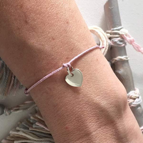 Small silver heart medal cord bracelet