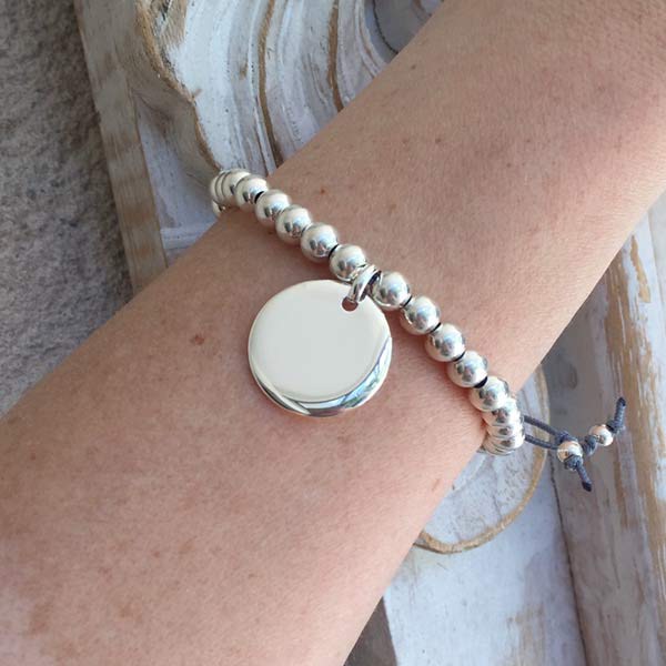 Elise bracelet with large silver beads and medal