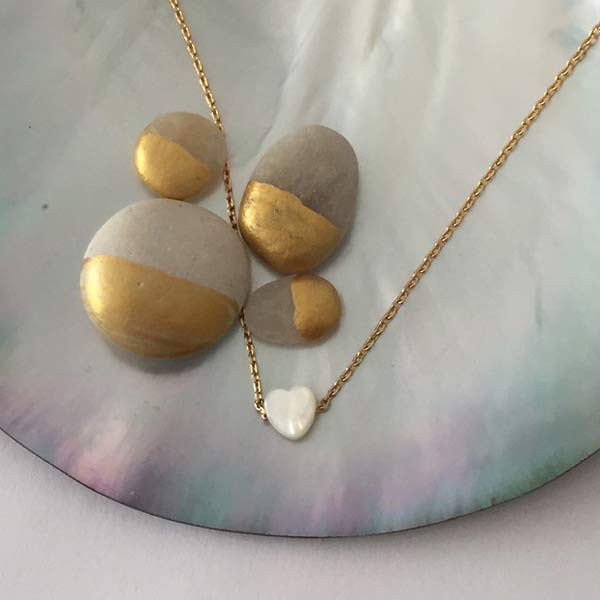 Gold plated chain necklace with mini white mother-of-pearl heart