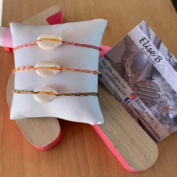 Mother-of-pearl cowrie cord bracelet