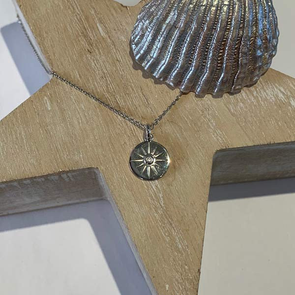 Silver chain necklace with zircon star medal