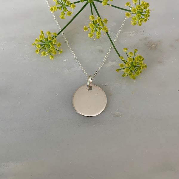 Small silver medal necklace