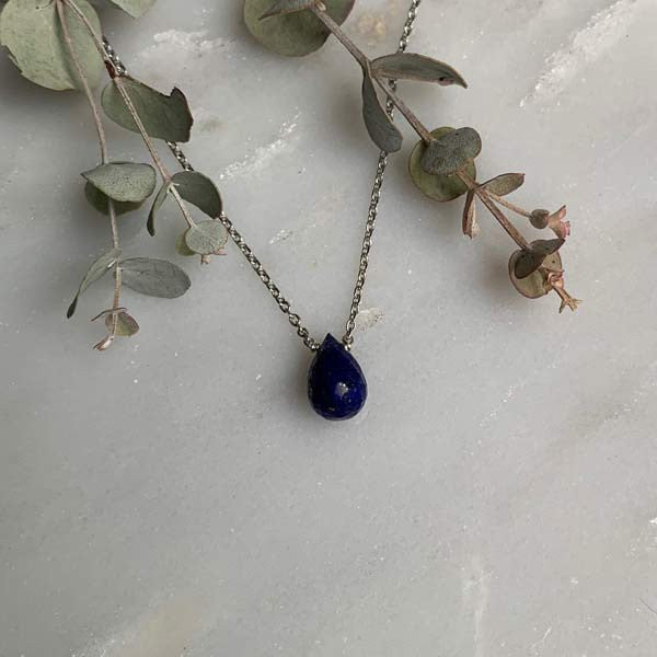 Silver chain necklace with faceted lapis lazuli drop