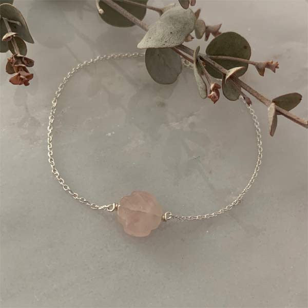 Silver chain bracelet with small faceted rose quartz cross