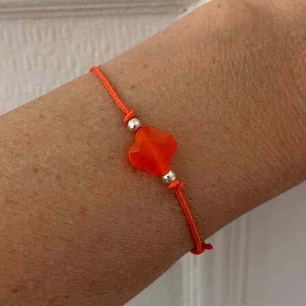 Small orange cross cord bracelet with silver beads