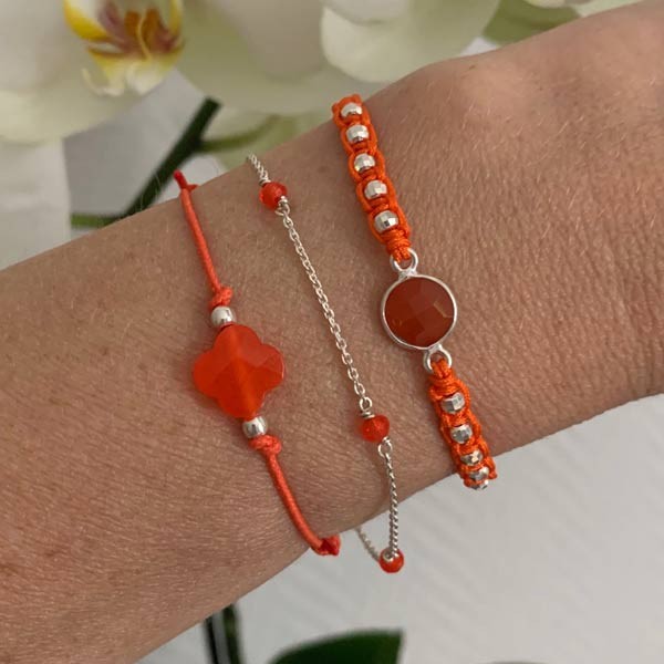 Small orange cross cord bracelet with silver beads