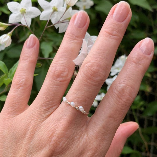 Fine silver ring with 3 oval white pearls