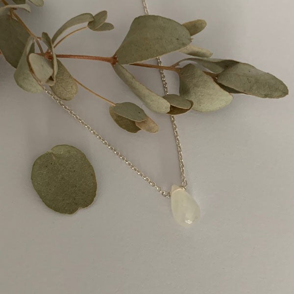 Silver chain necklace with faceted white moonstone drop