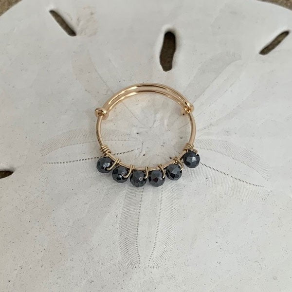 Fine gold filled hematite ring