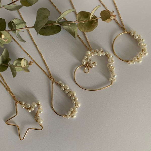 Gold plated chain necklace with white freshwater pearl drops 