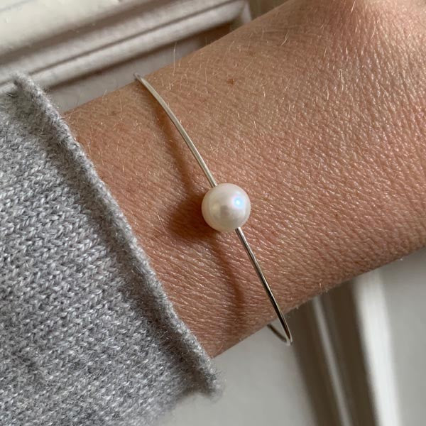 Fine silver bangle bracelet with white pearl