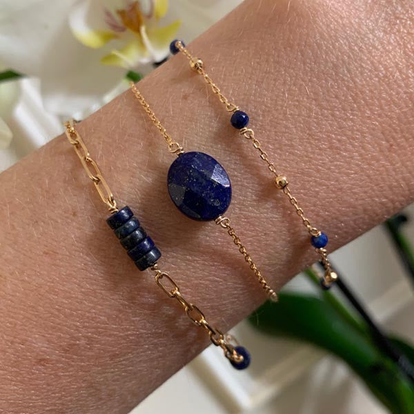 Gold plated chain bracelet with faceted oval lapis lazuli