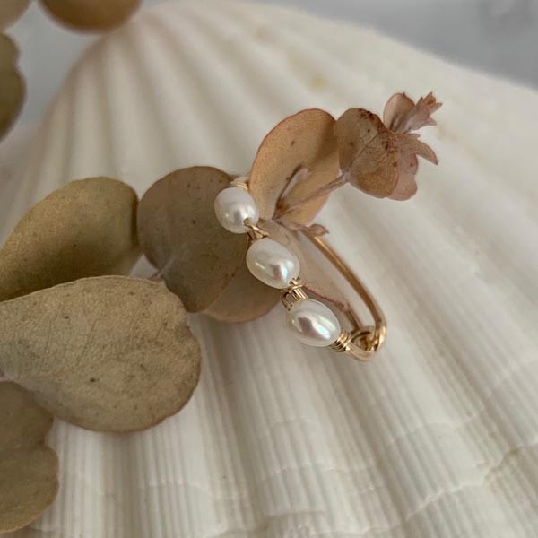 Fine gold filled ring with 3 oval white pearls