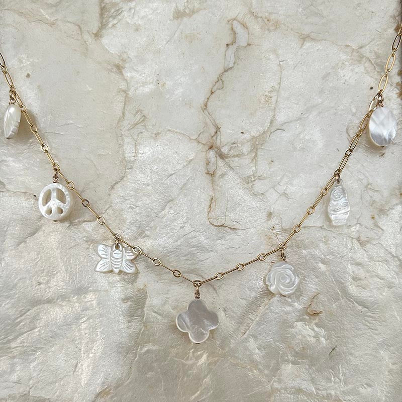 Gold plated chain necklace with 7 small white pearls 