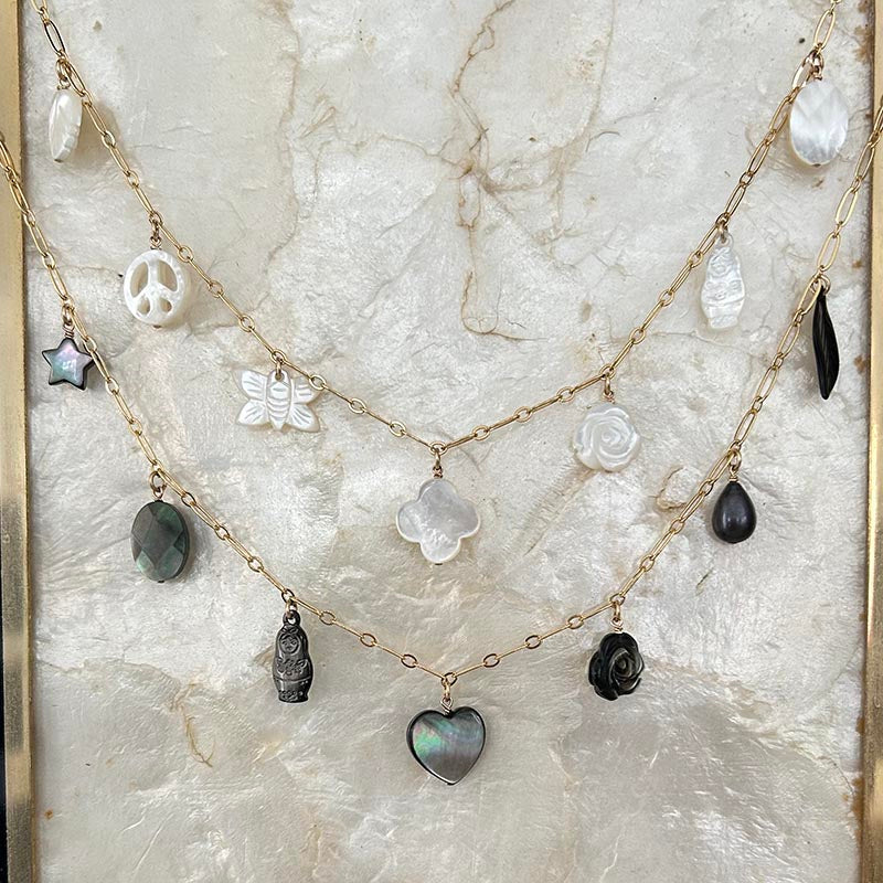 Gold plated chain necklace with 7 small white pearls 