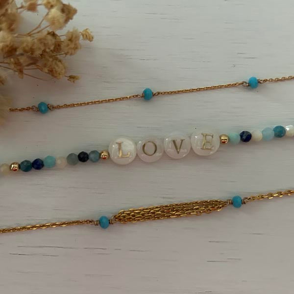 Gold plated chain bracelet with triple chains and small turquoise stones