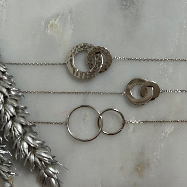 Silver chain necklace with 2 large hammered rings