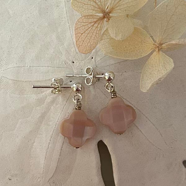 Silver earrings with white mother-of-pearl cross and faceted pompoms