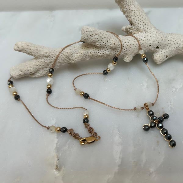 Gold plated chain necklace with oval faceted blue chalcedony